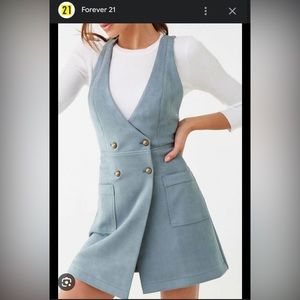 Faux suede light blue/gray jumper dress with front pockets.